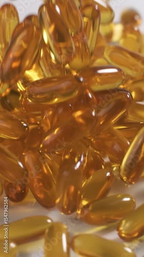 Wallpaper Mural Vitamins and supplements fall onto a table in slow motion. Vertical Video. Torontodigital.ca