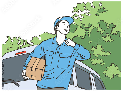 軽バンの前で荷物を運ぶ配達スタッフ