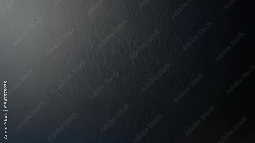Metallic hashtag symbol on a dark textured surface; focus on social media and communication.