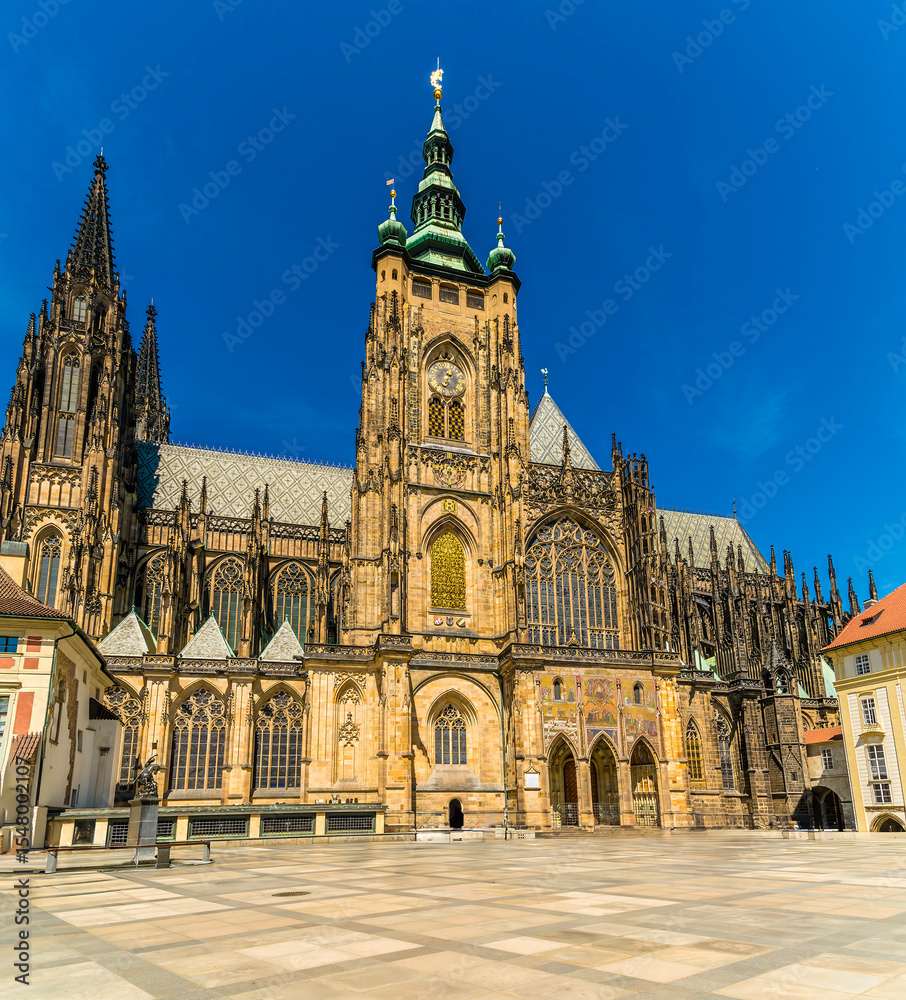 Fototapeta premium A view showing the side entrance to Saint Vitus Cathedral in the castle complex in Prague in springtime