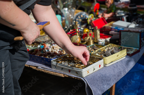 A person looking for some deals in a flea market