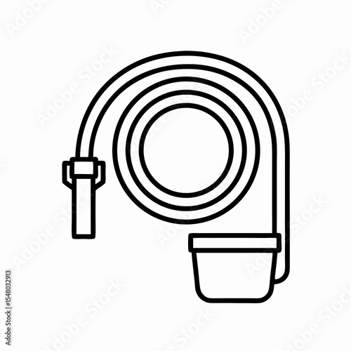 hose coiled with bucket for stable cleaning or horse care routine