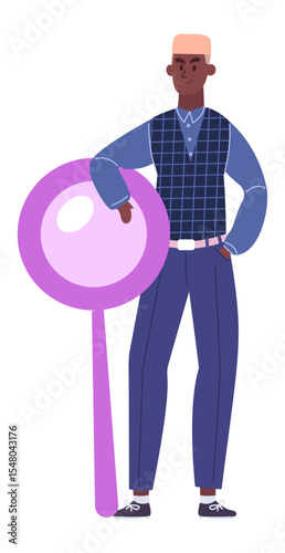 Young black businessman with blond hair is standing and leaning on a big magnifying glass, representing the concept of market research and business analysis