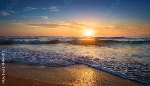 ocean sunrise over seashore shore and waves the sun is rising up over sea horizon