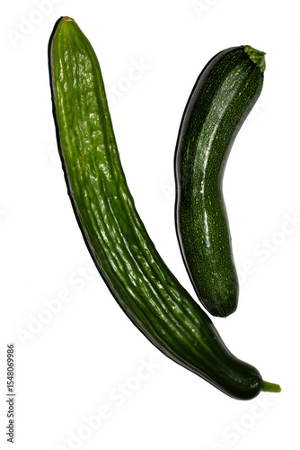 Close up of home grown cucumber courgette zucchini baby marrow vegetable skin  green on white background