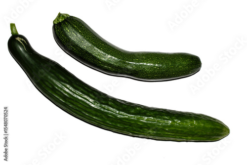 Close up of home grown cucumber courgette zucchini baby marrow vegetable skin  green on white background