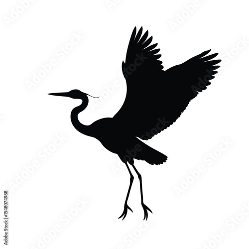 silhouette of a heron bird with wings outstretched