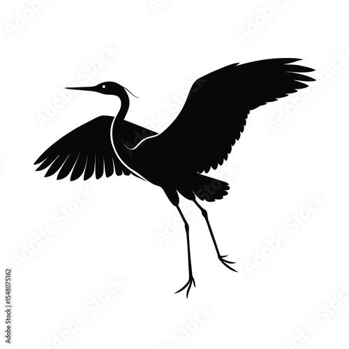 silhouette of a heron bird with wings outstretched