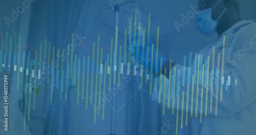 Medical staff in scrubs drawing fluid from vial into syringe in treatment bay, with chart overlay