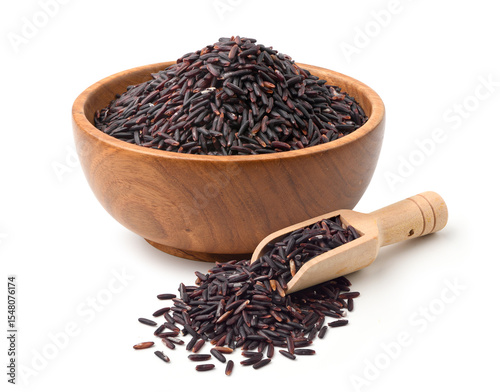Riceberry grains in wooden bowl isolated on white. (photo image with retouching process)