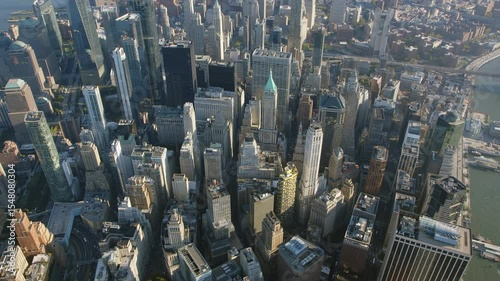 Aerial Overhead Top Down Zoom Out View Of Tall Office Buildings. Manhattan, New York City, USA. High Quality Content Shot from Helicopter.



