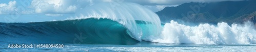 Massive ocean wave crashing on Oahu's North Shore, turquoise, rock