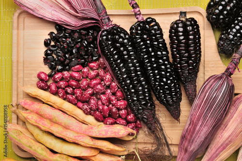 Andean Purple Corn and Traditional Beans on a Wooden Board