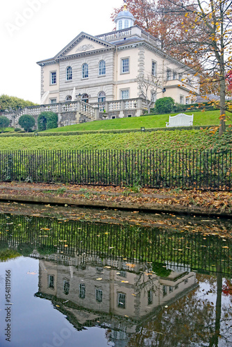 Historic house reflected in a canal in London
