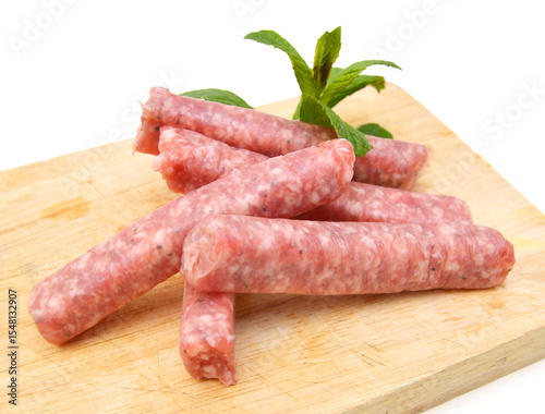 Wallpaper Mural Raw meat sausages isolated on white background  Torontodigital.ca