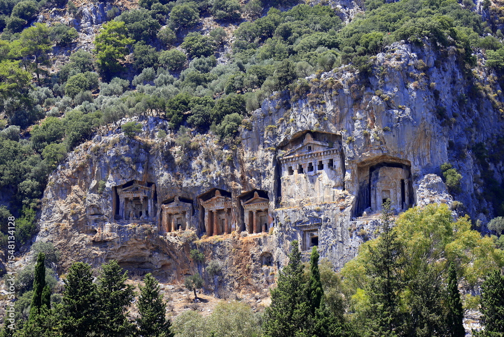 Fototapeta premium Lycian rock-cut tombs in Turkey. Greek ancient tombs, UNESCO site