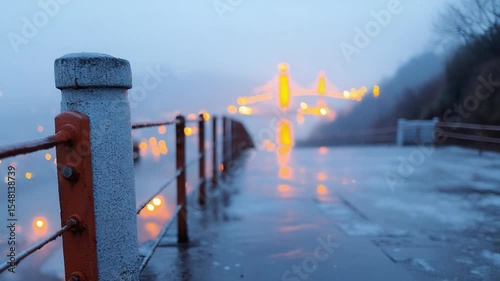 Pathway to Bridge: A moody scene unfolds along a rain-kissed pathway leading the eye toward the enchanting illuminated bridge and capturing the serenity of the moment.