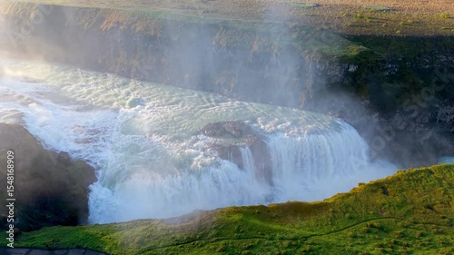 Aerial Views of a Majestic Waterfall Gullfoss Accompanied by a Rainbow. Iceland