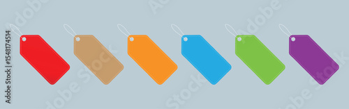 Six colorful blank price tags with strings for retail or sale