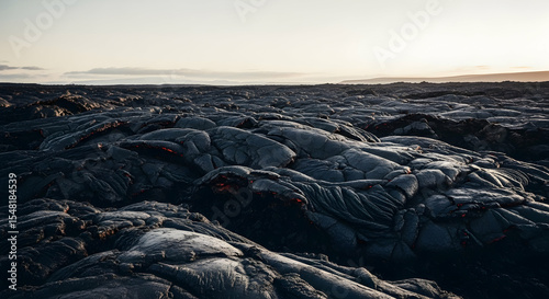 Barren Landscape Of Hardened Lava Flow At Twilight In Volcanic Territory