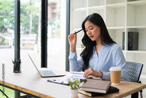 A young businesswoman ponders for a career path.