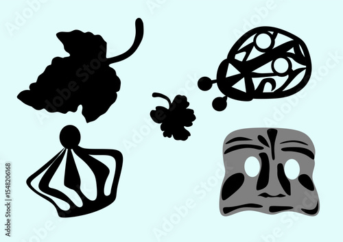 Set of brooches: crown, mask, beetle, maple leaves.