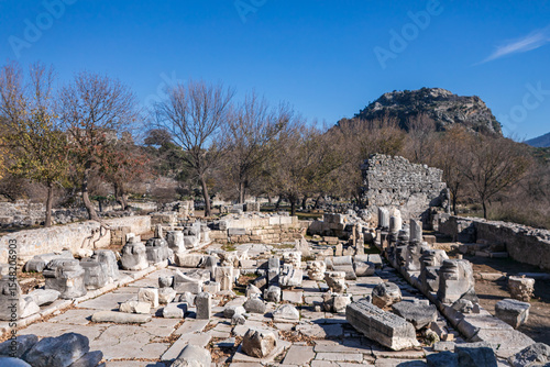 View of ancient Greek city Kaunos in Caria or Caunus in Roman period in Anatolia. Famous historical and archeological site. Popular place for family travel on summer vacation. Dalyan, Mugla Turkey