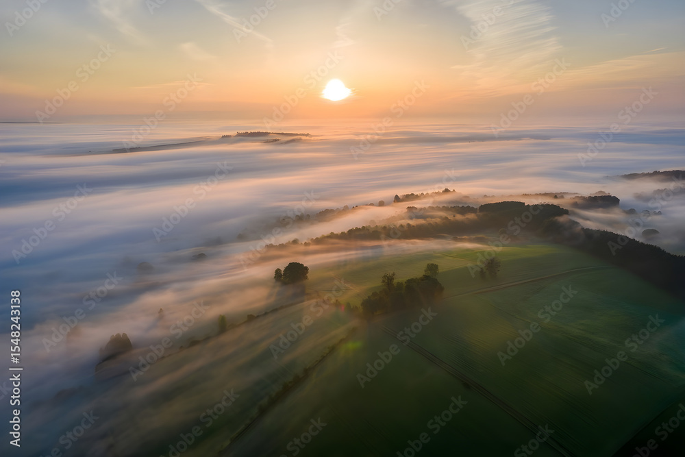 Fototapeta premium Aerial View of Sunrise Over Foggy Green Fields and Trees, High Quality Professional Image