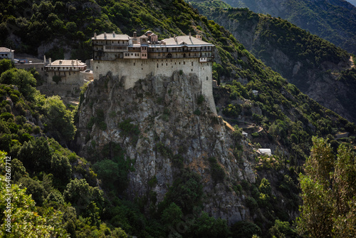 The historic Simonopetra Monastery, an Eastern Orthodox marvel, built precariously on a massive rock cliff on Mount Athos, Greece. A stunning testament to faith, architecture, and spiritual heritage.
