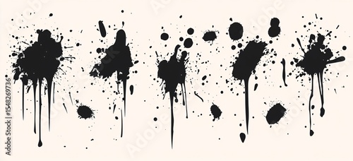 Black ink splatters on white background