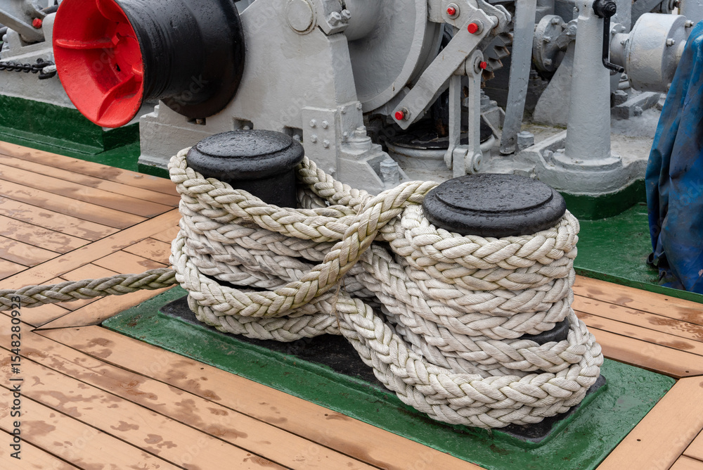 Fototapeta premium Mooring rope on a bollard on a ship.