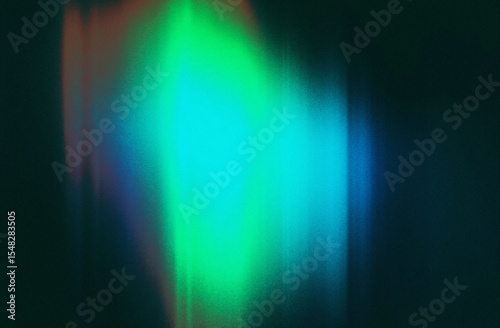 Light leak overlay showcasing green and turquoise hues on dark background textured