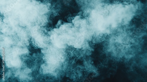 Swirling mystical blue smoke creates abstract shapes and patterns against a dark background, evoking a sense of mystery and depth in artistic expression.