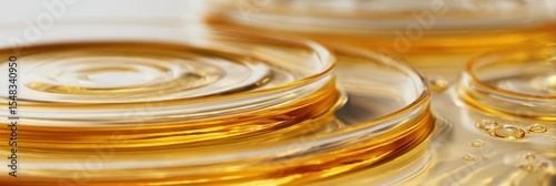 Close-Up View of Rippling Golden Liquid Surface, Depicting Clean and Radiant Texture, Perfect for Beauty, Health, and Wellness Concepts