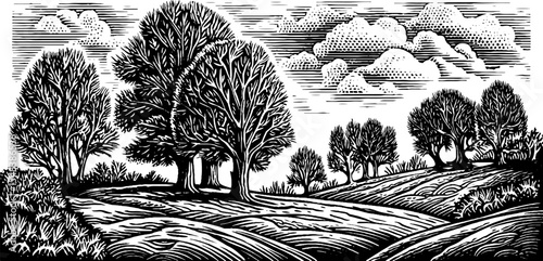 Serene spring meadow with trees mottled by melting snow in black and white