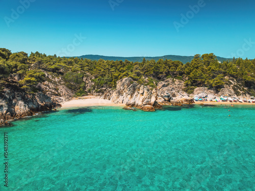 Fototapeta Naklejka Na Ścianę i Meble -  Paradise Kavourotripes Beach, Chalkidiki, Greece. Aerial view of beautiful tropical beach with turquoise waters