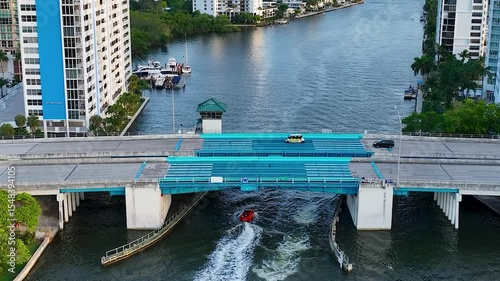 4K drone footage of canal and draw bridge in Ft. Lauderdale Florida. Footage of boats and hotels