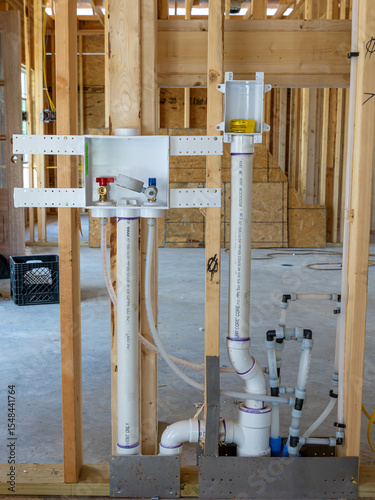 New construction laundry room rough in plumbing electrical 2x6 wall framing 