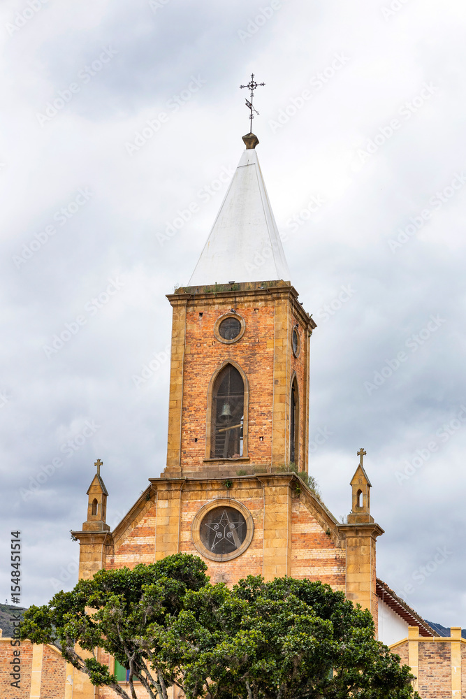 Fototapeta premium Raquira, Boyaca - Colombia. May 11, 2025. Saint Anthony From the Wall Parish, a Catholic church.