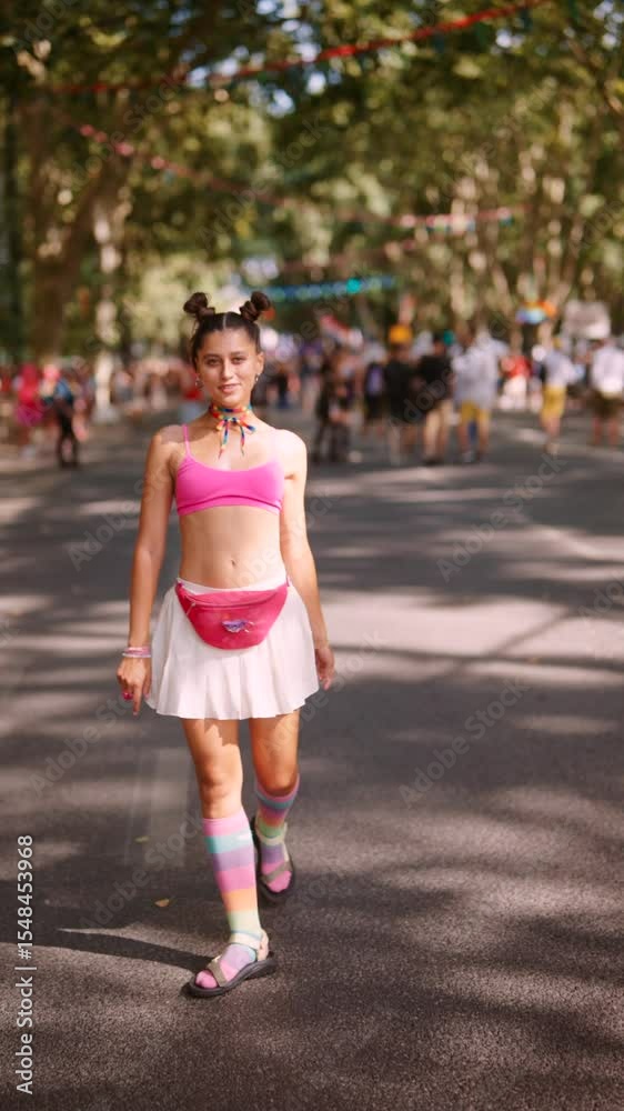 A Festive Participant Dressed in a Colorful and Vibrant Outfit during the Outdoor Event A Festive Participant Dressed in a Colorful and Vibrant Outfit during the Outdoor Event