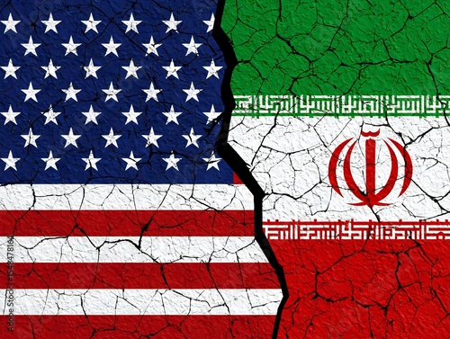 Cracked US and Iranian flags divided USA split conflict tension international relations