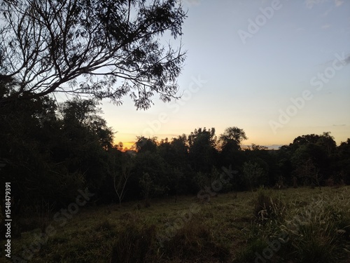 O pôr-do-sol em uma fazenda localizada em Boituva, interior do estado de São Paulo, Brasil. photo