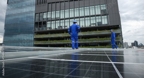 Professional solar engineer installation and inspection the solar panel of solar roof system , verifying system integrity, green renewable energy or sustainable energy concept