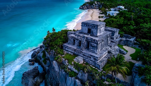 Ancient Mayan ruins on a cliff overlooking a turquoise beach