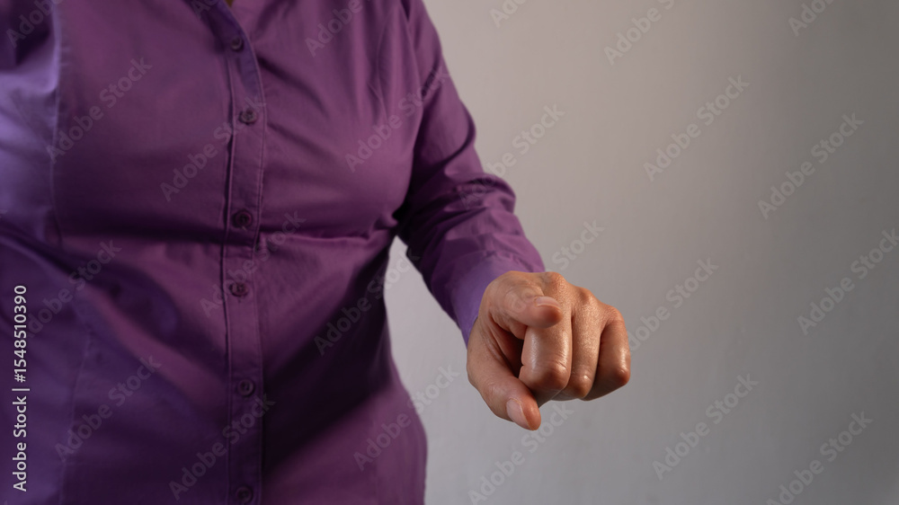 Fototapeta premium Business person's hand pointing with his hand