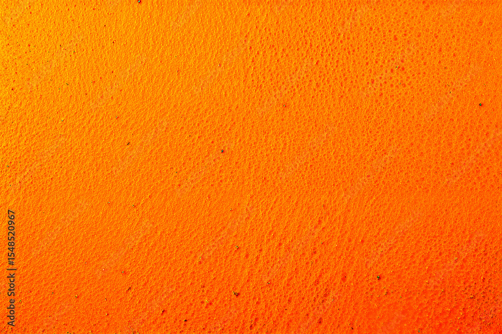 Naklejka premium Vibrant yellow paint strokes on canvas detail