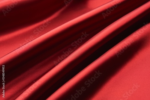 Smooth red silk drape folds fabric texture