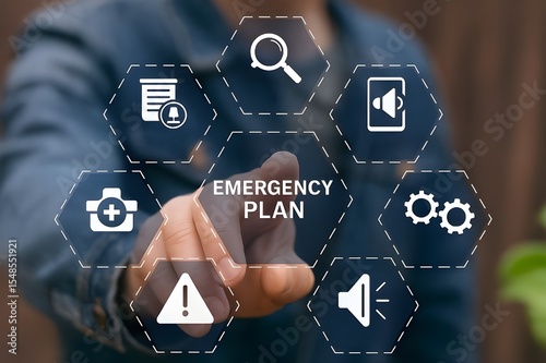 Businessman touching EMERGENCY PLAN text button to learn and prepare in emergency situation. Concept of emergency response plan. Emergency Preparedness and Training. 