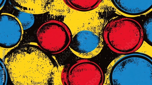 Abstract pattern of overlapping circles in red, blue, and yellow on black