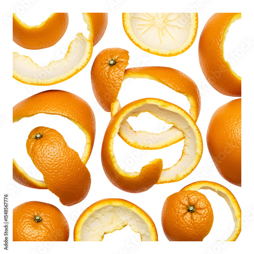 Isolated orange peels and spirals arranged artistically on white background showing texture and citrus freshness